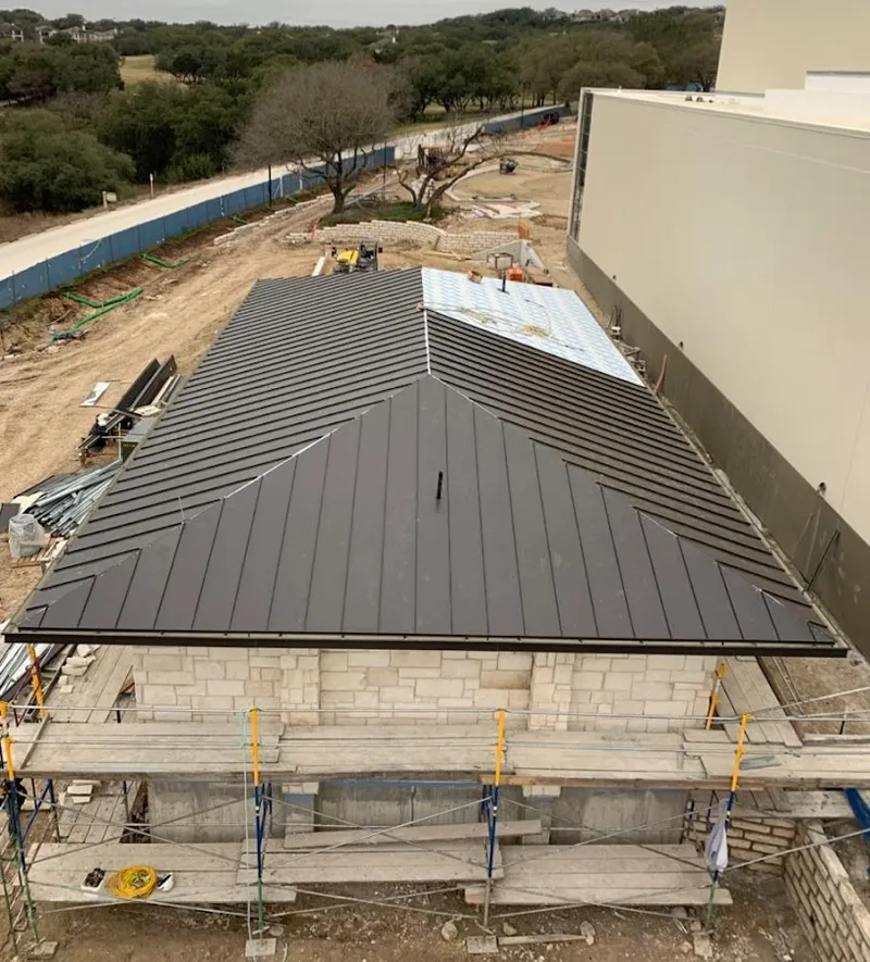 Metal roof new construction with scaffolding in Richmond